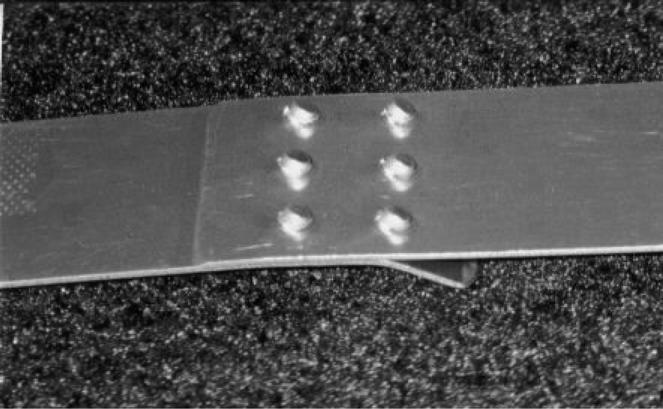 Coupon with 426 rivets failed by tipping